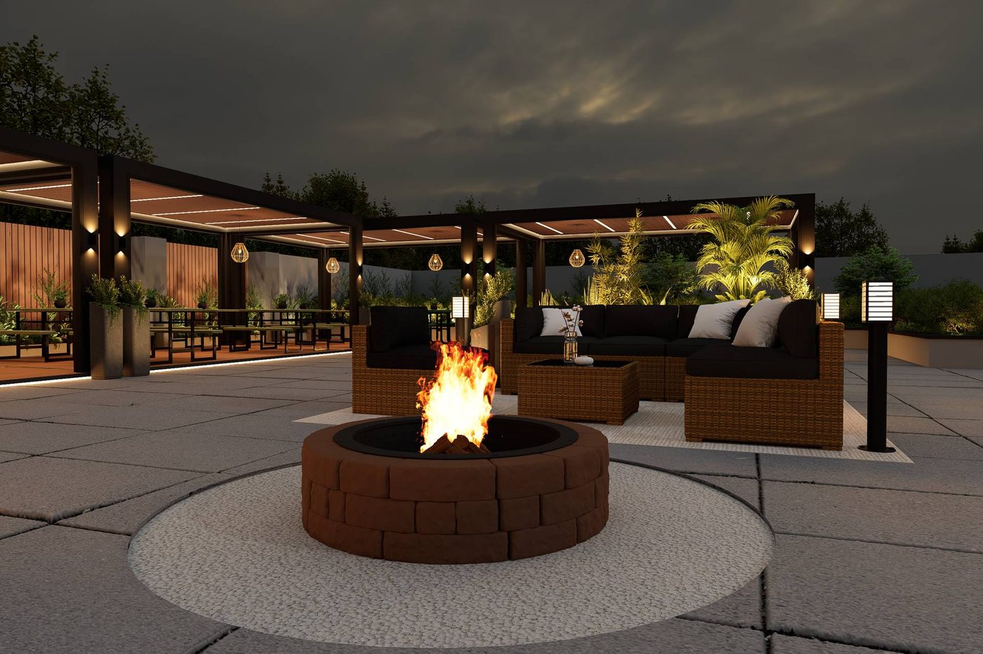The fire pit on the patio at Robata Albany, lit at night