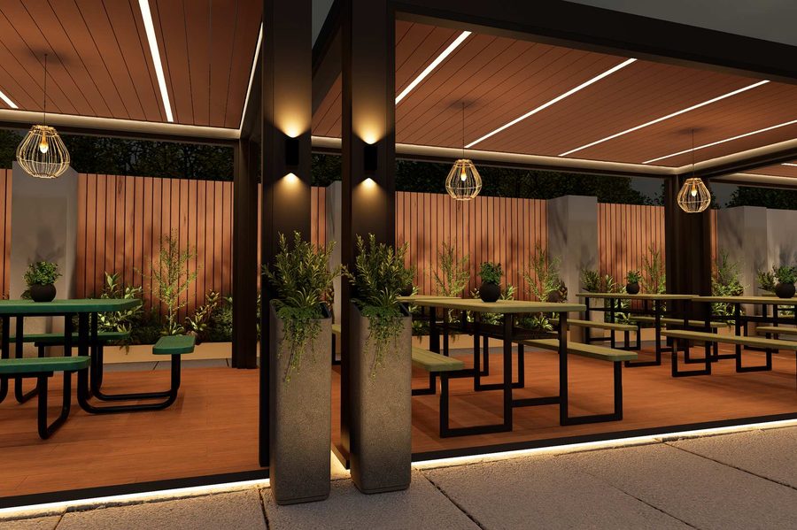 Communal tables under the lit pergola at Robata Albany